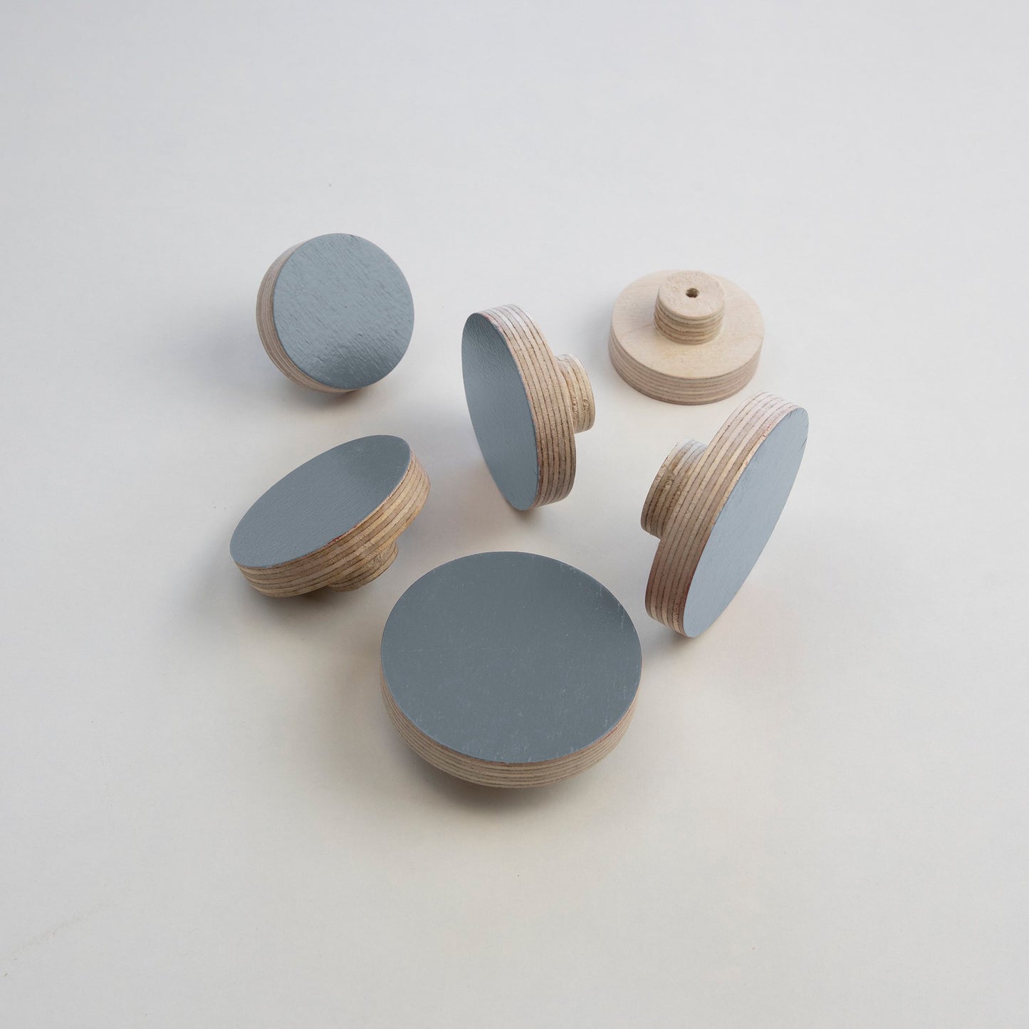 grey round plywood knobs