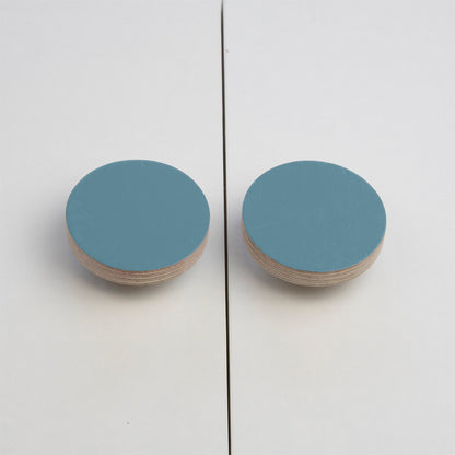 round blue plywood knobs