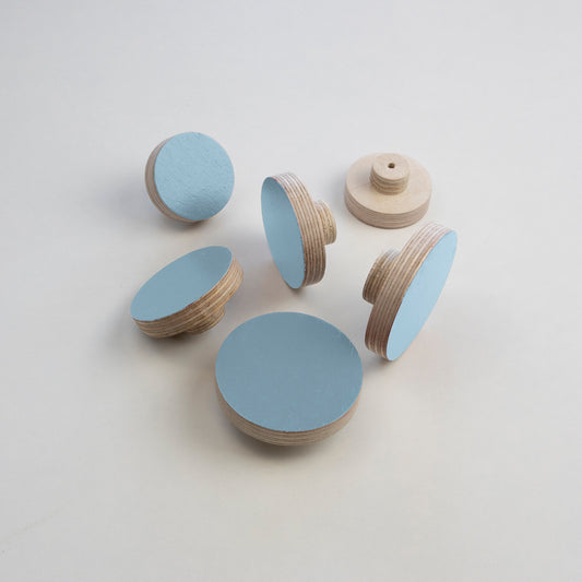 pastel blue plywood knobs