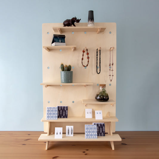 pegboard with tiered shelving