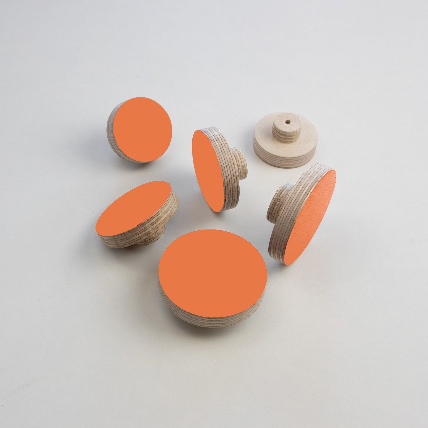 orange round plywood knobs